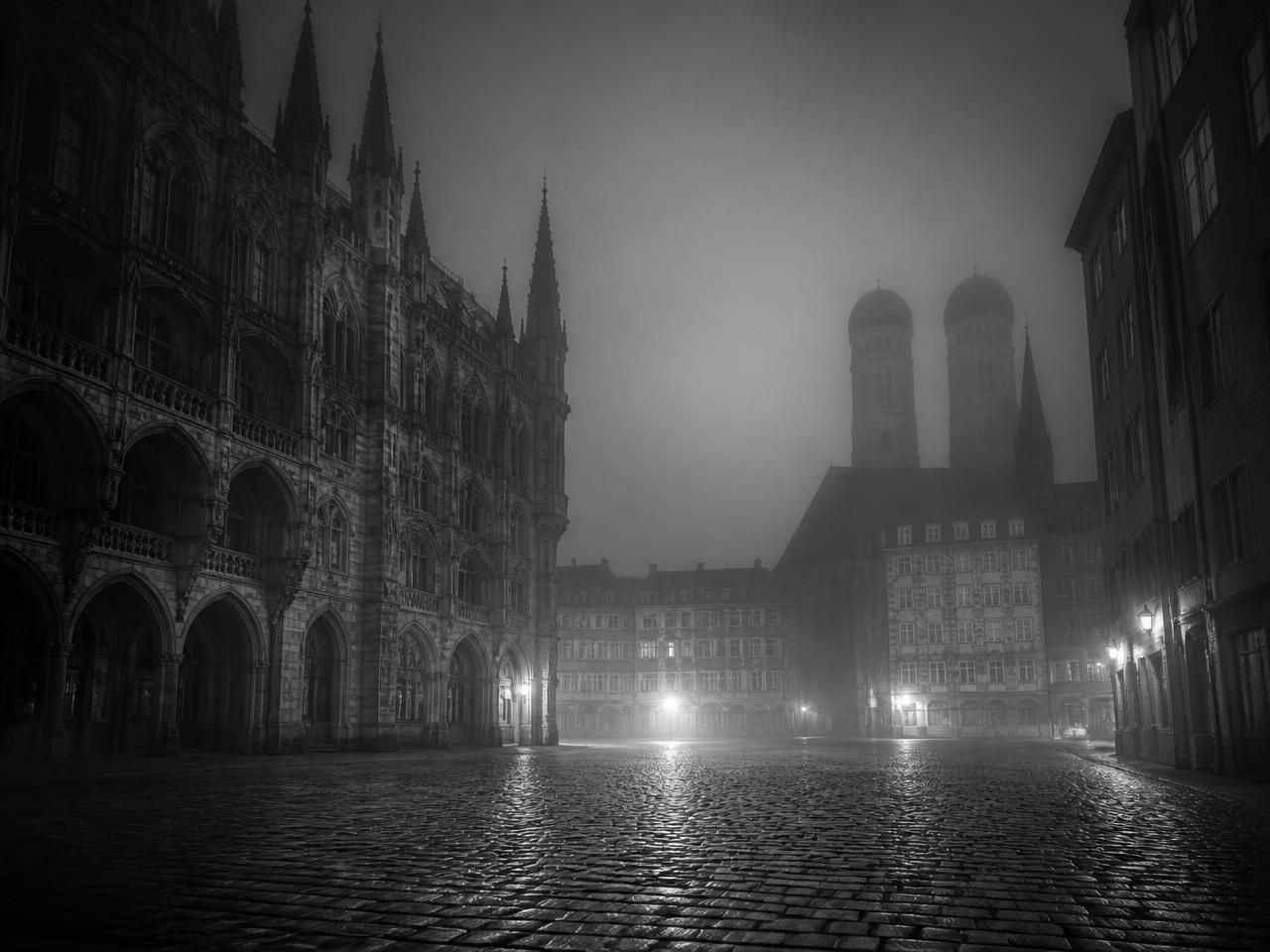 Foggy historic square in Munich at night
